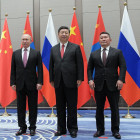 El presidente ruso, Vladimir Putin, con sus homólogos chino y mongol, Xi Jinping y Khaltmaa Battulga. 