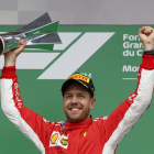 Sebastian Vettel celebra su triunfo en el Gran Premio de Canadá, donde se hizo con el liderato del Mundial.