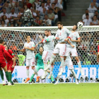 Cristiano Ronaldo empató el partido a dos minutos para el final con un gol de falta directa que superó la barrera.
