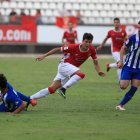 Abel Molinero, centro, durante un partido con el Murcia esta temporada.