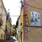Una de las calles de L’Albi con una foto antigua. 