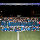 Los jugadores y los entrenadores de la Escola de Futbol Baix Segrià ayer durante el acto de presentación.