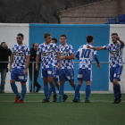 Diversos jugadors del Tamarit celebren el gol anotat per Sanjuan.