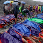 Al menos 126 los muertos por un deslizamiento de tierras en Birmania