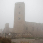 Imatge del castell ahir amb una intensa boira.