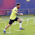 Leo Messi, sonriente, se entrenó ayer sin problemas en la vuelta al trabajo del FC Barcelona.