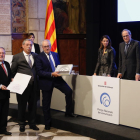 Juan Cal, Santiago Costa i Robert Serentill van rebre ahir el premi al Grup SEGRE de mans del president Torra a la Generalitat.