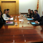 La reunión del vicepresidente del Govern, Pere Aragonès, la portavoz, Meritxell Budó, y representantes de CatECP, en el departamento de Economía este lunes.