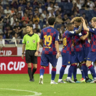 Los jugadores del Barça celebran el tanto de Rakitic en el tiempo añadido.