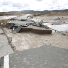 Una carretera destrozada por la DANA de octubre de 2019 en Cervià.