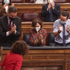 El presidente Sánchez y dos de sus vicepresidentes, Calvo e Iglesias, aplaudiendo a Montero, ayer.