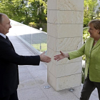 Vladimir Putin recibiendo a Angela Merkel en Sochi. 