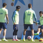 La plantilla del Barça se ejercitó ayer en la Ciutat Esportiva antes de viajar hoy a Málaga.
