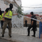 Efectivos de la Policía Nacional durante un registro realizado en Melilla  en el marco de la operación.
