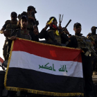Tropas iraquíes celebran la victoria sobre el Estado Islámico.