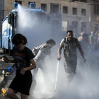 Una batalla campal entre policies i immigrants al centre de Roma se salda amb tretze ferits