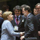El Presidente del Gobierno, Mariano Rajoy, y la canciller alemana, Angela Merkel, ayer en Bruselas.