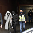 Tres de los detenidos durante la operación en Cornellà.