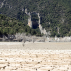 La cua del pantà de Canelles, eixuta l’agost de l’any 2019 per la sequera i les altes temperatures.