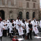 Una concentración de médicos en la plaza Sant Jaume de Barcelona.