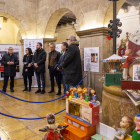 La inauguración de la exposición en la Paeria, con el presidente de la Associació Reis Mags de Lleida, Óscar Caberol, y el encendido del alumbrado navideño en Bagergue. 