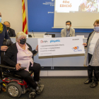 La AAVV de Balàfia y la Associació Playchic dieron un cheque de 1.000 euros para Aremi.