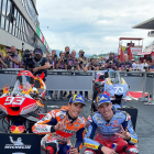 Marc y Àlex Márquez celebran la segunda y tercera posición en la calificación del GP de Italia.