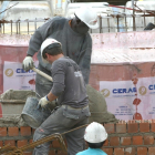 Trabajadores procedentes de otros países en una obra. 