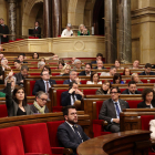 Los portavoces de ERC, Junts y PSC marcan el sentido de sus formaciones en una votación en febrero.