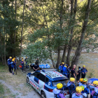 Agentes de los Mossos junto a practicantes de rafting.