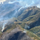 Vista general del incendio de Llançà desde el aire donde se observan las distintas zonas afectadas por las llamas.