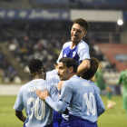 Montero, aixecat per Agüero després d’un dels gols diumenge.