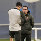 Xavi i Lewandowski, durant l’entrenament d’ahir.