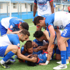 Joan Domingo remunta la banda, amb la grada de gom a gom al fons.