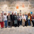 Alguns dels artistes que exposen a l’Església Vella de Penelles i que ahir van presentar la mostra. - COMUNICANT