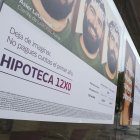 Imatge d’arxiu d’una oficina bancària amb una oferta. - EFE/J.L. CEREIJIDO