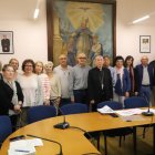Representants de la Xarxa d’Entitats de la Diòcesi, ahir amb el bisbe de Lleida, Salvador Giménez. - MAGDALENA ALTISENT