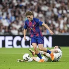 Fermín, autor del gol blaugrana, marxa de Carreras. - EUROPA PRESS