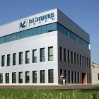 Un edifici del Grup Vall Companys i una botiga de bonÀrea. - GRUP VALL COMPANYS