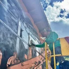 Es muraus se pinten damb ajuda de plataformes elevadores. - GRAFFTECH FEST
