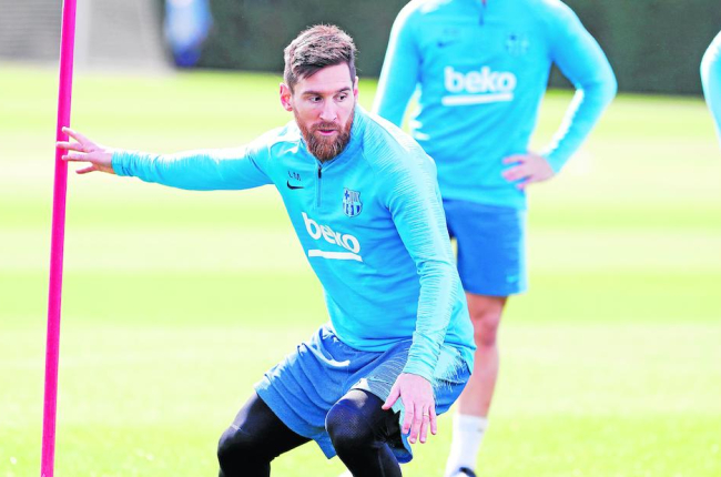 Leo Messi va tornar als entrenaments amb els companys del Barça.