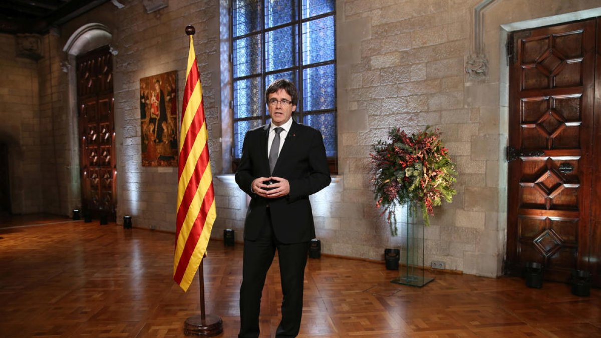 El president Puigdemont, ahir durant la seua al·locució de Cap d’Any des del Palau de la Generalitat de Barcelona.