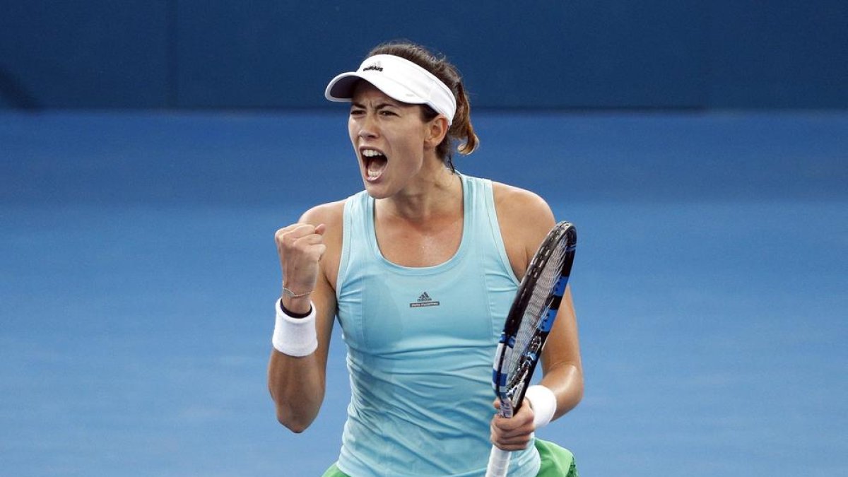 Garbiñe Muguruza celebra su victoria y el pase a semifinales.