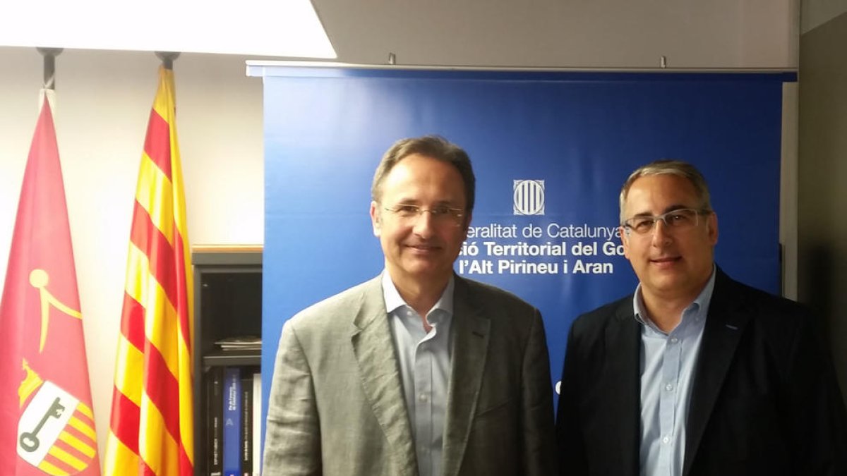 Josep Palau, a la derecha de la imagen, junto a Albert Alins.