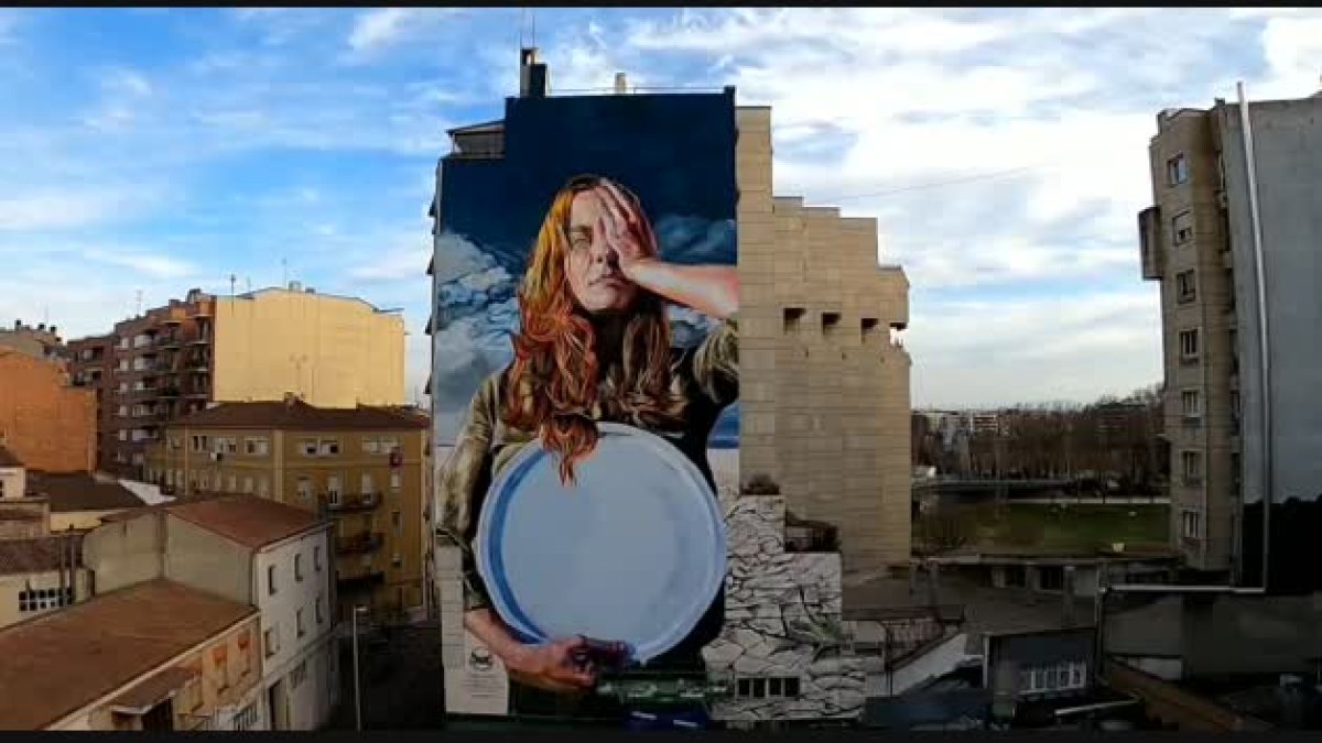 Finalizado el mural solidario en una fachada de Lleida