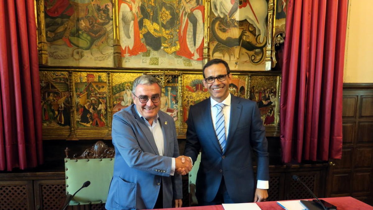 Ros i Masana, després de la firma del conveni.