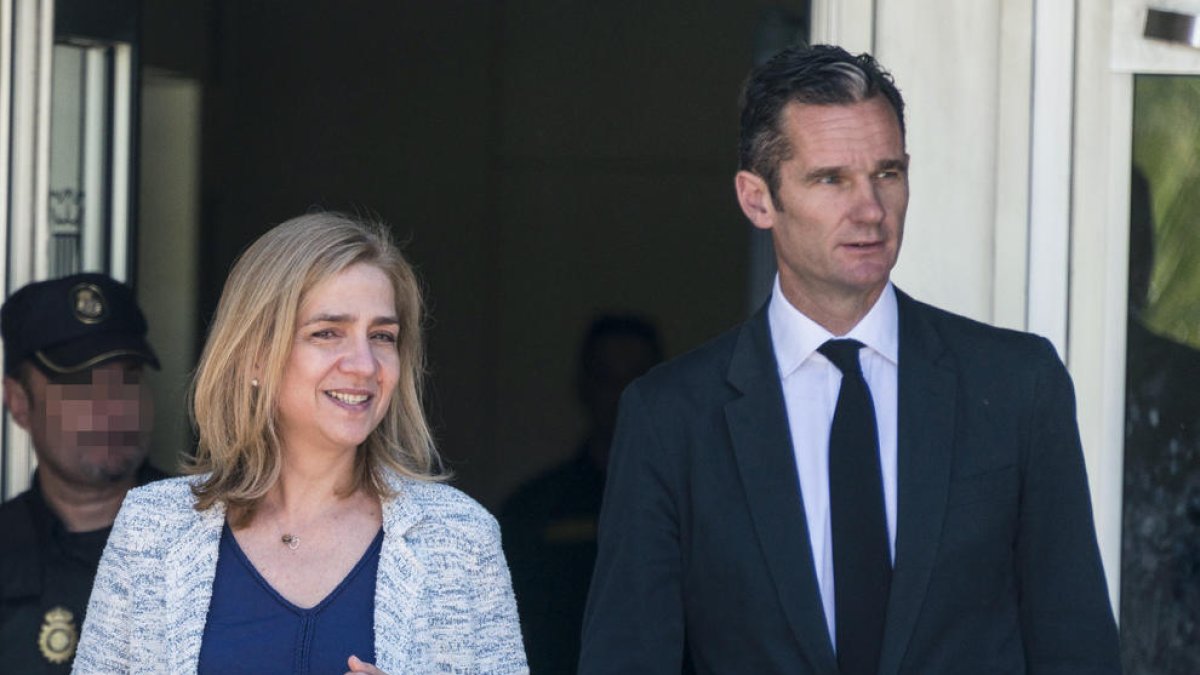 La Infanta Cristina e Iñaki Urdangarin durante el juicio de Nóos en la Audiencia de Palma.