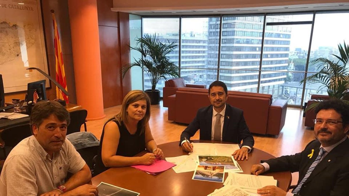 Cañadell, junto a Calvet e Isidre Gavín, secretario de Movilidad.