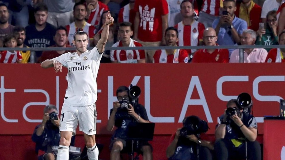 Gareth Bale celebra el tercer gol del Madrid, amb què sentenciava el matx a Montilivi.