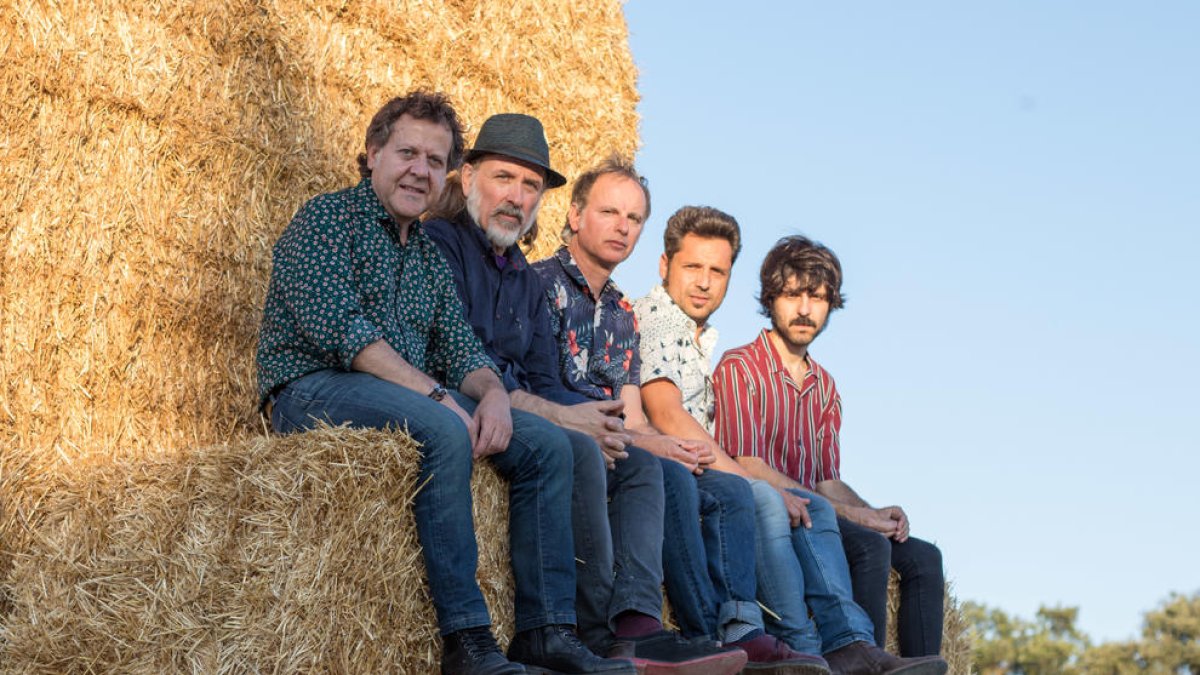 El popular trio de Constantí amb dos membres de la banda, el juliol passat a Guissona.